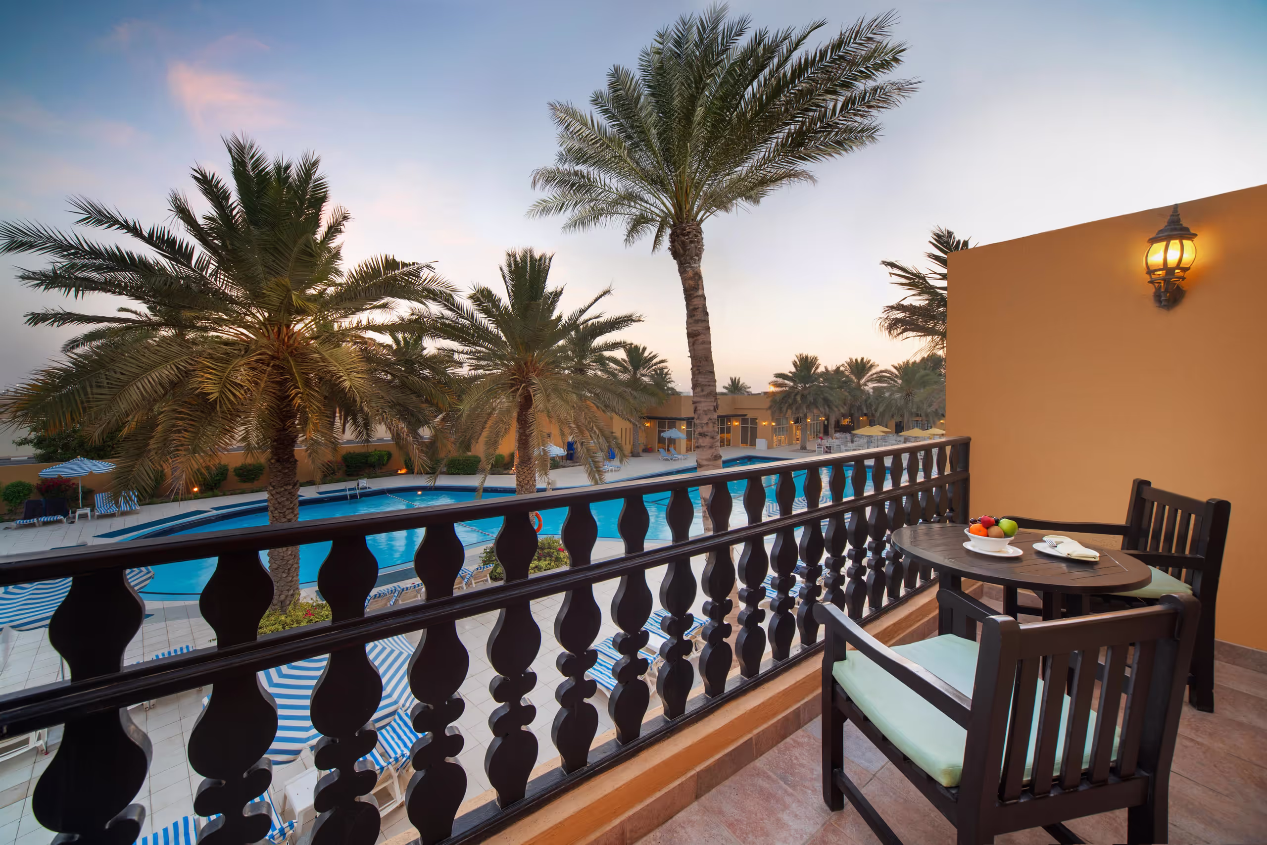 Convenience defines daily life in Al Hamra Village. Al Hamra Mall sits at the community’s heart with Spinneys, VOX Cinemas, casual dining, pharmacies, and essential services under one roof, while RAK Medical Center Al Hamra provides on‑your‑doorstep healthcare. Families appreciate having RAK Academy – British School Al Hamra inside the community and nurseries just a few minutes away. Commuting is easy: Al Hamra Village is directly off Sheikh Mohammed Bin Salem Road (E11) with quick links to Sheikh Mohammed Bin Zayed Road (E311), putting Al Marjan Island about 10 minutes away, Ras Al Khaimah city center in roughly 20–25 minutes, and Dubai reachable in around an hour depending on traffic. RAK International Airport is approximately 30 minutes by car. Here, the essentials are close, the road network is simple, and everyday errands stay stress‑free.