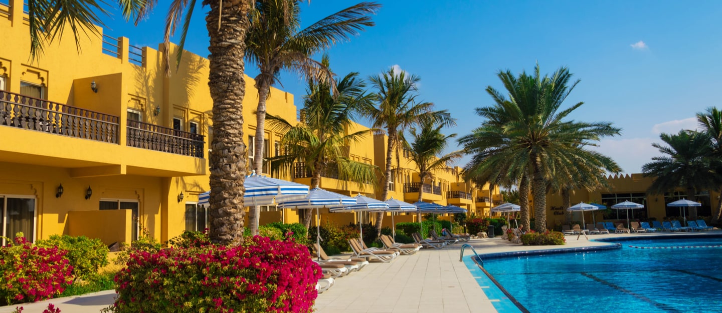 Al Hamra Village brings waterfront living to life on Ras Al Khaimah’s sunlit shoreline, where you can wander from your front door to the marina boardwalk, private beach, and fairways in minutes. Within this master-planned community, mornings begin with Arabian Gulf views and end with sunset strolls past café terraces at Al Hamra Marina & Yacht Club. Golfers gravitate to the 18‑hole Al Hamra Golf Club, a Peter Harradine design with the rare thrill of floodlit night golf, while resort neighbors like Waldorf Astoria Ras Al Khaimah, Hilton Al Hamra Beach & Golf Resort, and The Ritz‑Carlton, Al Hamra Beach elevate weekends to five‑star status. Whether you’re launching a paddleboard at dawn or booking a table by the water after work, Al Hamra Village makes every day feel like a holiday, with the space, serenity, and scenery people move to the coast to find.